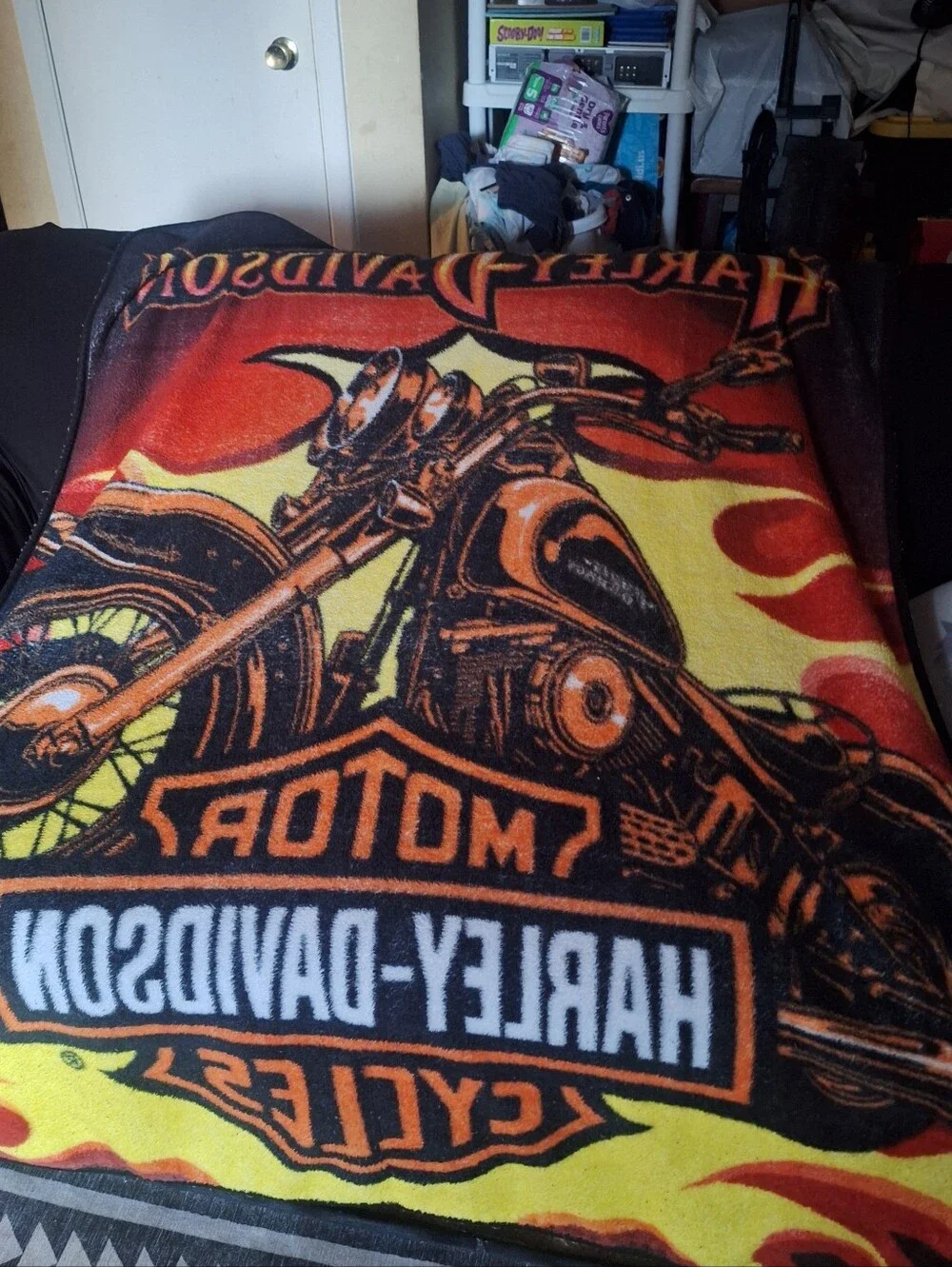 Harley Davidson Blanket in black and orange is a cozy and stylish addition.